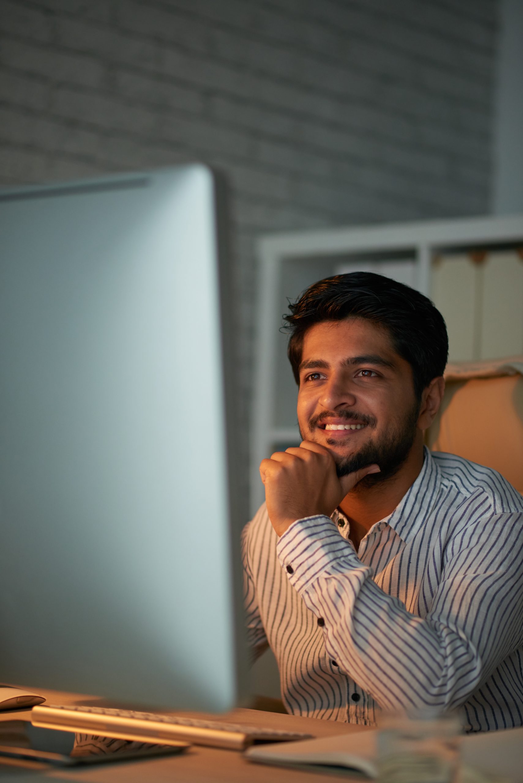 Young Indian business executive working in office